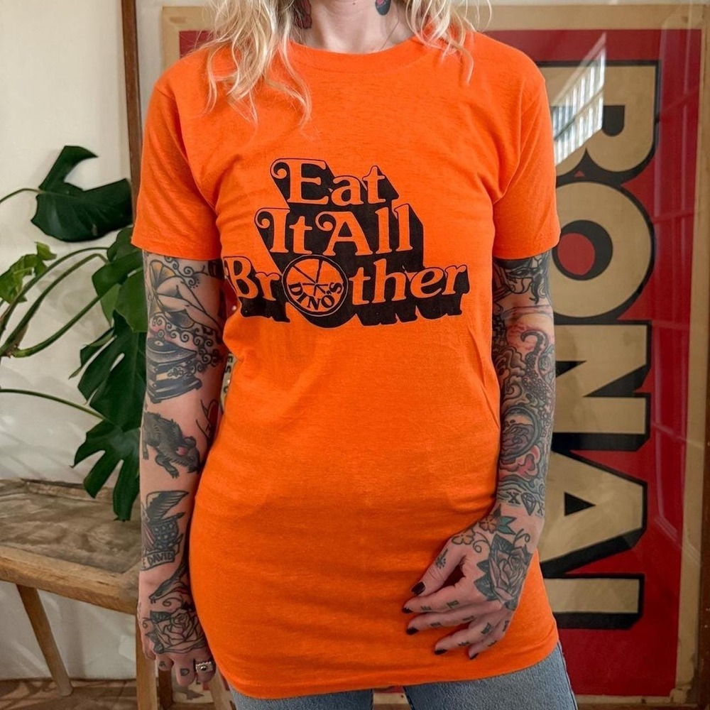 Vintage 1970s Dinos Pizza "Eat it all Brother" orange graphic t shirt